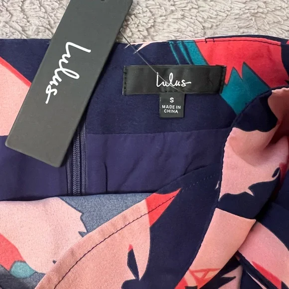 Lulu’s Navy Abstract Print wrap skirt with cropped halter top set. - Picture 3 of 9